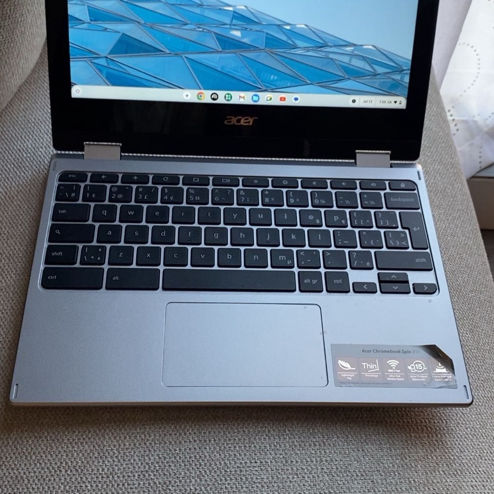 Acer Silver Convertible Laptop with Minimalist Design
